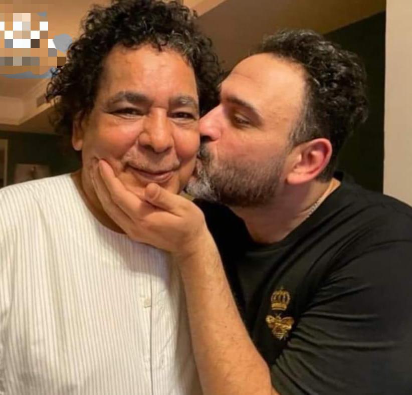 رد أكرم حسنى عن سرقة كلمات أغنية الكينج «اللى»