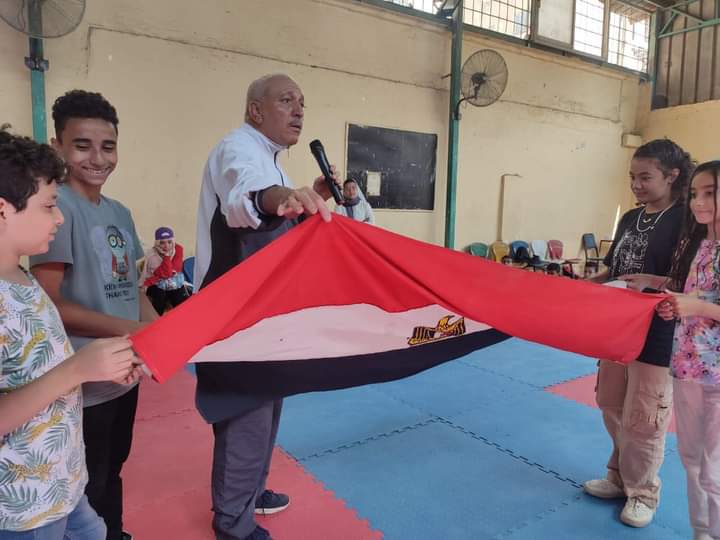 قمة المناخ وعلم مصر في تدريبات الشعب التخصصية للطلائع